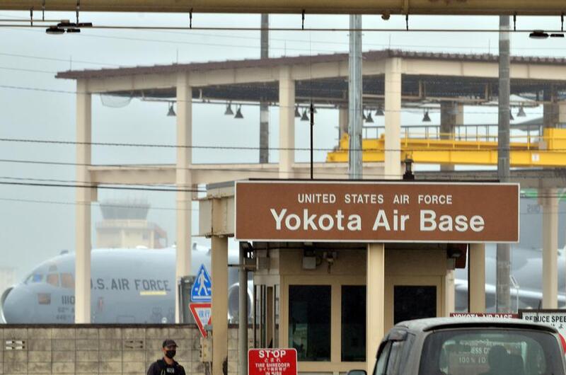A sign for Yokota Air Base is shown.