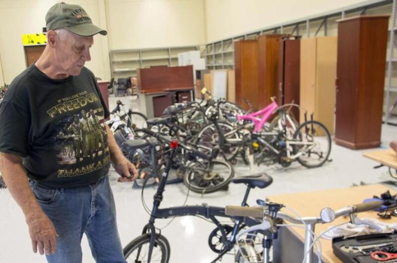 Army veteran Daniel Melton prepares to fix another abandoned bicycle at Camp Humphreys, South Korea, Sept. 12, 2023. 