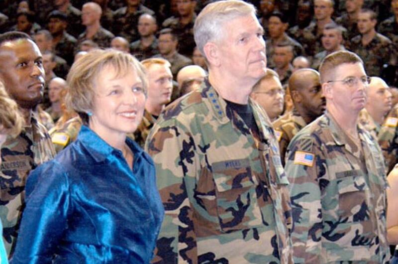 Chairman of the Joint Chiefs of Staff Gen. Richard B. Myers and his wife Mary Jo watch Sunday’s USO show.