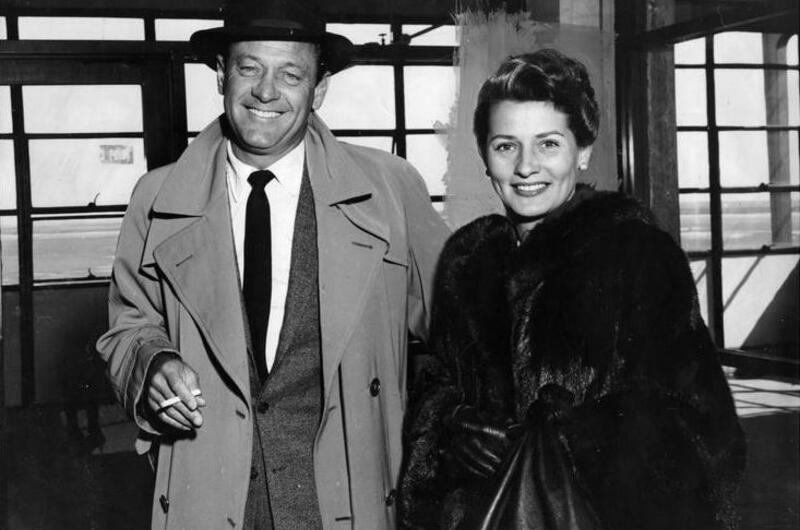 William Holden and Brenda Marshall pose for a picture together.