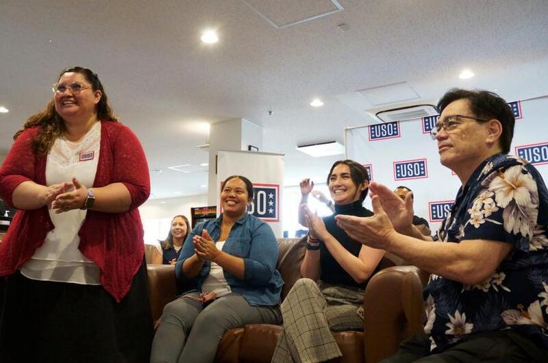 Service members and veterans take part in a virtual meetup with the stars of “The Covenant,” Jake Gyllenhaal and Dar Salim, at the USO on Yokosuka Naval Base, Japan, Friday, April 21, 2023.