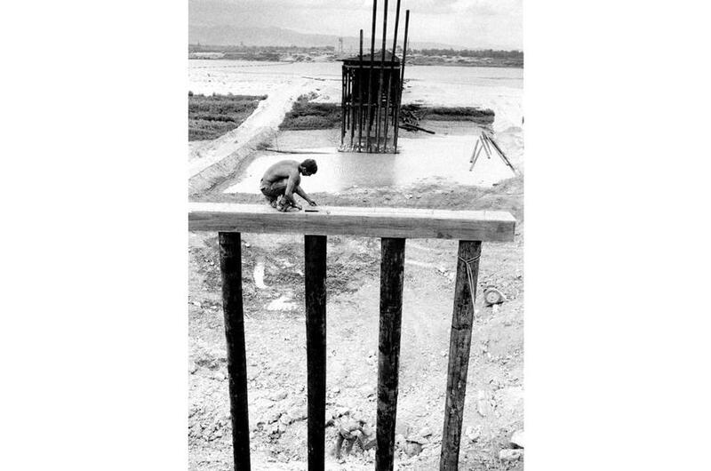 A Seabee from Naval Mobile Construction Battalion 4 works on the “Liberty Bridge”.