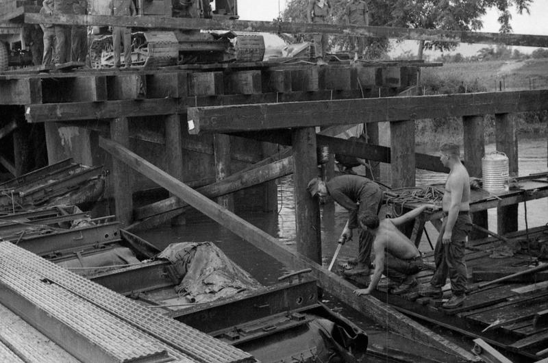 Seabees build a timber bridge near Phu Bai, Vietnam.