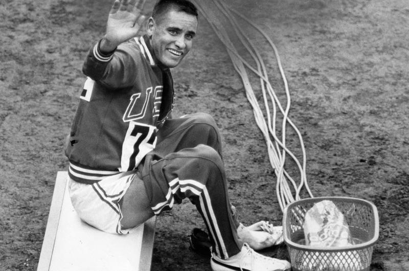 A tired Mills gives a victory wave