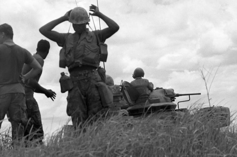 Members of the 2nd Battalion, 1st Regiment, 1st Marine Division take a break during sweep operations on the north side of Go Noi Island.
