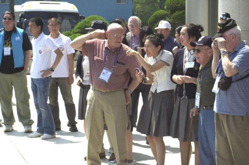 Veterans standing in a line.