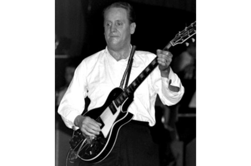 Guitar legend Les Paul performs at the Grant Heights NCO Club during a tour of military clubs in Japan, the Philippines and Okinawa.