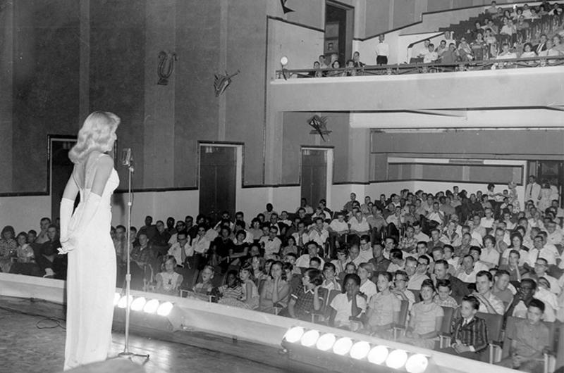 There is nothing like a blonde, or so the song goes, and singers Sally Jo Knowles isn't getting any arguments from servicemen in the audience at the new U.S. Armed Forces Theater in Saigon.