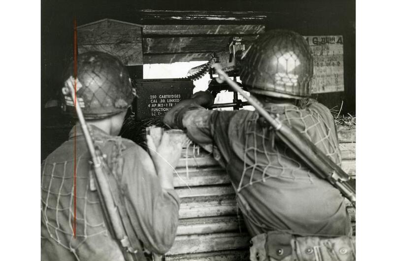 Soldiers of the 1st Republic of Korea Division keep their machine gun ready for any threats against their outpost on the Demilitarized Zone.