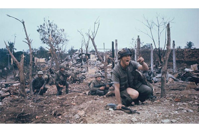 Staff Sgt. Bob Thoms leads his Marines through the city of Hue during the Tet Offensive. Stars and Stripes photographer John Olson's work during Tet — some of it converted to 3D format for access by the blind — is the subject of an exhibition currently on display at the Newseum in Washington, D.C.