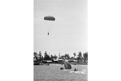 Army of the Republic of Vietnam (ARVN) paratroopers and sky divers land on Da Nang river.