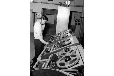 Koyu Nakamura, AFRTS engineer, works in the master control room at the Rycom Plaza Studios.