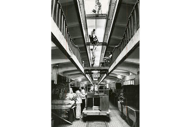 Workers solve 'lift' problem in elavatorless warehouse.