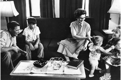 Sgt. Van Dyne,; Darrell, 10; wife Margaret; Joni, 1; Jackie, 8; Relax 'at home'; The family of Air Force SSgt. Arthur Van Dyne of the 6002nd Air Intelligence Sv. Gp. at Shiroi Air Base.