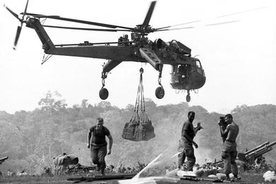 A "Flying Crane" helicopter delivers supplies to the Bu Dop Special Forces camp, which had come under pressure from Communist forces in recent days.