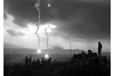 Flares fall over Hill 50, west of Landing Zone Ross, silhouetting troops from 2/12, 1st Cavalry who are taking part in a three-day operation in the Que Son Valley.