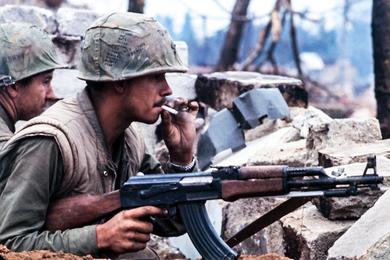 During the lengthy battle for control of the old Vietnamese national capital city of Hue, U.S. Marines are ready for the enemy's next move.