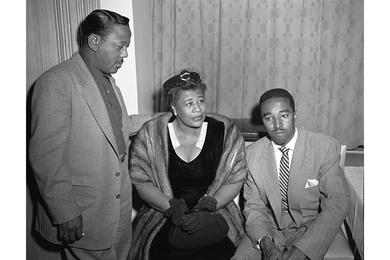 Trumpetman Roy Eldridge (left), Vocalist Ella Fitzgerald and Bassist Ray Brown chat informally at a the Nikkatsu hotel yesterday afternoon.