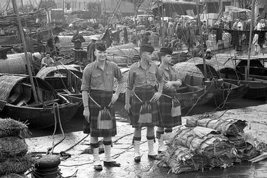 Hospitalman 2C Tom Zugsay (left) of HSA and Yoeman Frank Harris (middle) also of HSA play Scottish soldiers.