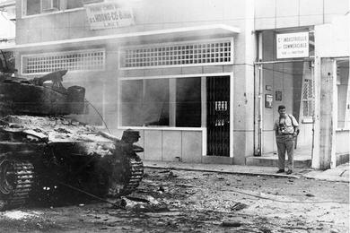 AP photographer Horst Faas in the doorway of the Associated Press Saigon bureau.