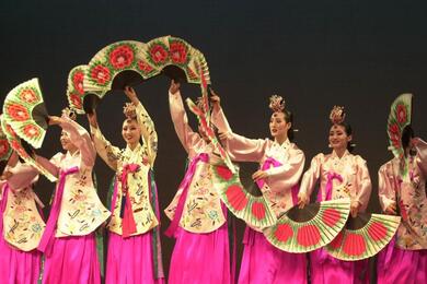 Korean women dancing fun dance.