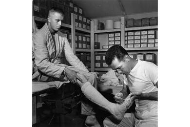 Spc. Paul W. Sebesky prepares a leg cast at the 121st Evacuation Hospital. 