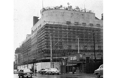 Scaffolding surrounds the building formerly known as The Ernie Pyle Theater.