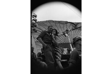 Anita Bryant performs cheek to cheek with Pfc. Girard F. Bordine from Baltimore, Md. Bryant was part of the Bob Hope Christmas Show.