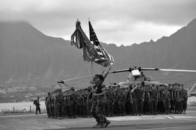Marines stand at attention.