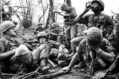 U.S. 1st Cavalry soldiers enjoy a respite from fighting in the Que Son Valley, 35 miles from Da Nang.