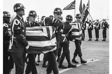 MPs carry the flag-draped caskets of Sgt. James L. Anderson of Camp Springs, Md., and Spc. 4 Larry M. Wood of Barstow, Ill., who along with two South Koreans were killed while on patrol at the DMZ.