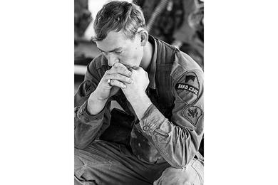 A 1st Cavalry soldier is deep in thought after returning from a mission near Landing Zone Ross, north of Chu Lai.
