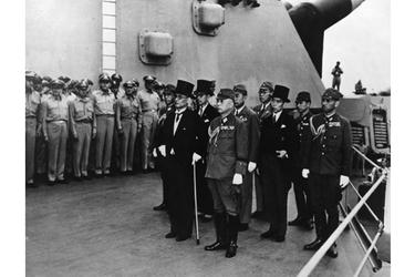 Japanese representatives arrive aboard the USS Missouri in Tokyo Bay to participate in formal surrender ceremonies on Sept. 2, 1945.