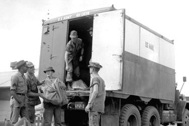 Mail is unloaded from the 41st's truck, known as the "Dear John Express."