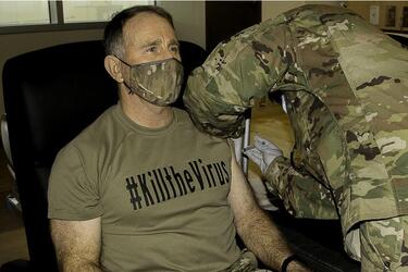 Then-U.S. Forces Korea commander Gen. Robert Abrams receives the COVID-19 vaccine at Camp Humphreys, South Korea, Dec. 29, 2020.