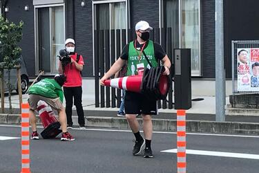 Over the course of the Olympics cycling event July 24-25, 2021, about 50 service members from Camp Zama volunteered to set up barriers and keep the 18 miles of roadway clear and safe.