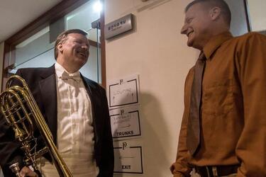 Blair Bollinger, left, a trombonist for the Philadelphia Orchestra, greets Staff Sgt. James Beeson, a trombonist for the 8th Army Band, backstage at the Seoul Arts Center's Music Hall, Thursday, June 8, 2017.