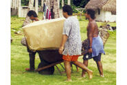Residents of an outer island of Palau retrieve boxes from the U.S. Air Force’s 1999 Christmas drop.