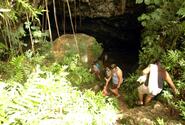 A group of Guam residents climb down to the freshwater caves in the Pagat area, where the island's native Chamorro residents found fresh water thousands of years ago.