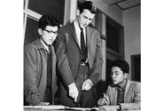 In March, 1958: John Rockefeller, center, teaches English grammar to Yukihiro Wada, left, and Hirofume Ando during a study session at International Christian University in Tokyo, where he is an exchange student and part-time teacher.