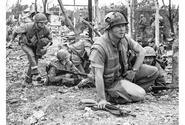 Marine Corps Staff Sgt. Bob Thoms assesses the situation before leading an assault on the Dong Ba Tower, considered a crucial objective for U.S. forces in the fierce battle for the city of Hue.
