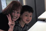 Gemini Sanford poses with one of the orphans at the Bikou-en Children's Care House in Shichinohe, Japan. 