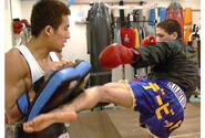 David Archuleta, right, mixes it up with sparing partner Masaaki Kato.