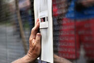 Preparing to cut another name into the black granite of the Vietnam Veterans Memorial Wall.