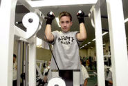 Kevin D’Aversa does a pull-up at the Yano Fitness Center.