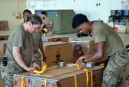 Airmen at Andersen Air Force Base, Guam, complete final preparations for supply bundles bound for remote Pacific islands as part of Operation Christmas Drop, Monday, Dec. 5, 2022.