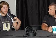 Humphreys High School senior football player Brent Carver and coach Steven Elliott take turns co-hosting "Breakfast with Sports Byline" at the Camp Humphreys, South Korea, Sept. 5, 2019.