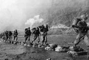 ROK troops cross a river during Operation Killing Zone.  