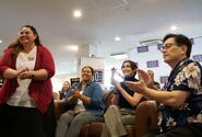 Service members and veterans take part in a virtual meetup with the stars of “The Covenant,” Jake Gyllenhaal and Dar Salim, at the USO on Yokosuka Naval Base, Japan, Friday, April 21, 2023.