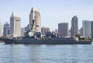 A sailor returns to the guided-missile destroyer USS Kidd at Naval Base San Diego after completing a coronavirus quarantine, June 5, 2020.
